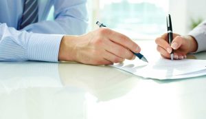 Firma contratto - fonte_Canva - Sicilianews24.it